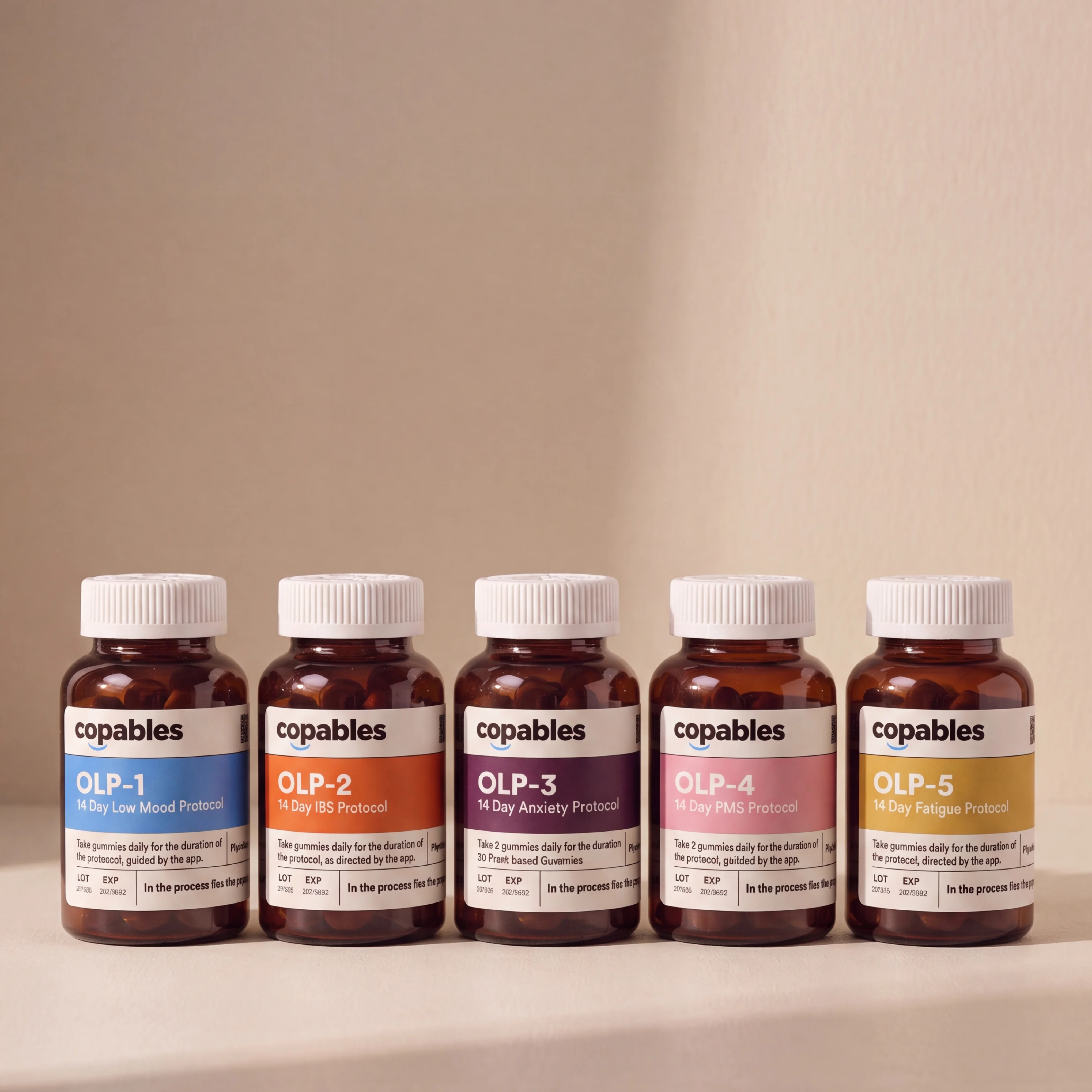 Five Copables OLP protocol bottles lined up: OLP-1 Low Mood, OLP-2 IBS, OLP-3 Anxiety, OLP-4 PMS, OLP-5 Fatigue.